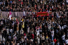 Pope Francis' body is carried in a coffin into Saint Peter's Basilica
